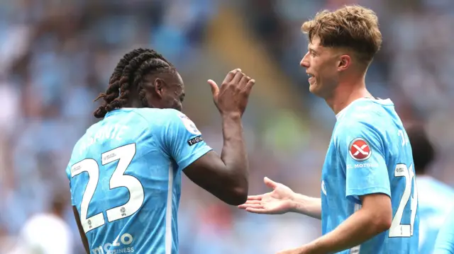 Brandon Thomas-Asante and Victor Torp celebrate