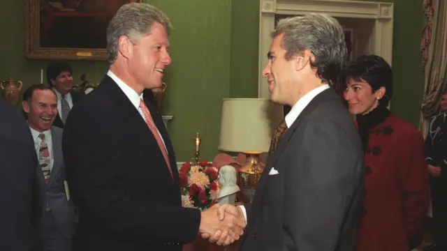 Bill Clinton is photographed with Jeffrey Epstein and Ghislaine Maxwell in 1993 at the White House.