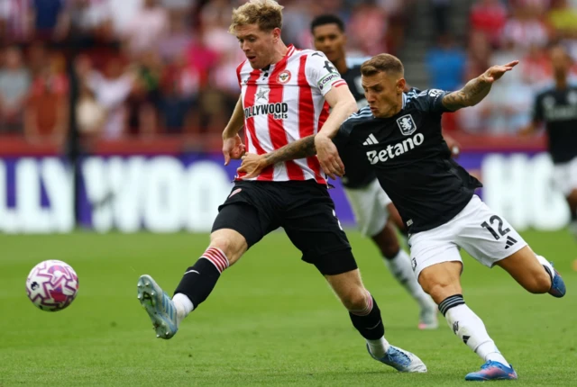 Brentford's Nathan Collins in action with Aston Villa's Lucas Digne