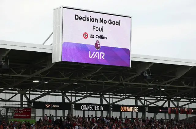 LED screen inside the stadium displays VAR decision