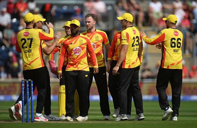 Sam Cook of Trent Rockets celebrates with team mates after taking the wicket of Jonny Bairstow of Welsh Fire during the The Hundred match between Welsh Fire Men and Trent Rockets Men at Sophia Gardens on August 24, 2025 in Cardiff, Wales.