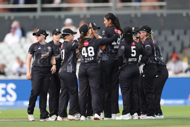 Mahika Gaur of Manchester Originals celebrates with team mates after taking the wicket of Georgia Voll of Birmingham Phoenix during the The Hundred match between Manchester Originals Women and Birmingham Phoenix Women at Emirates Old Trafford on August 24, 2025 in Manchester, England.