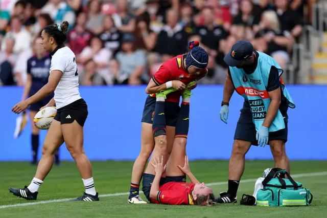 Spain players getting cramp out of team mate