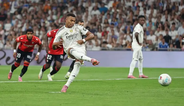 Kylian Mbappe taking a penalty