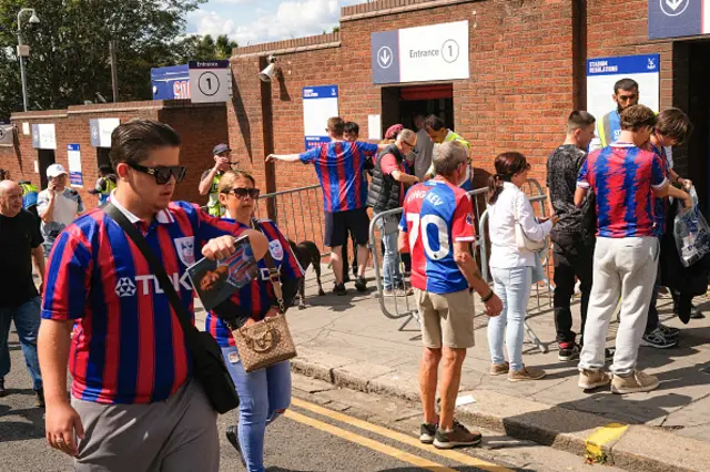 Crystal Palace fans approach Selhurst Park