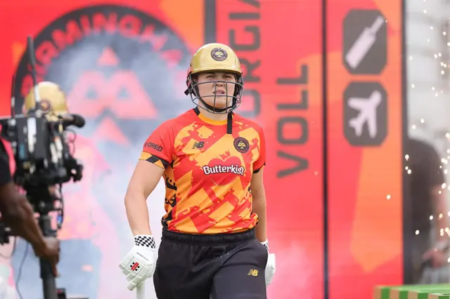 Georgia Voll of Birmingham Phoenix walks out to bat during the The Hundred match between Manchester Originals Women and Birmingham Phoenix Women at Emirates Old Trafford on August 24, 2025 in Manchester, England.