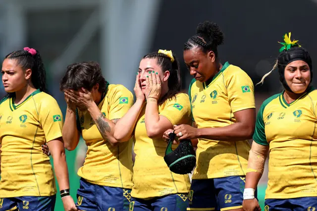 Brazil players in tears during the anthem