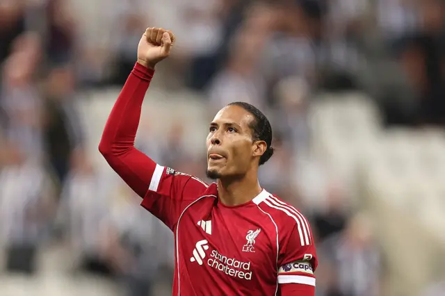 Virgil van Dijk of Liverpool celebrates at full-time following the team's victory in the Premier League match between Newcastle United and Liverpool at St James' Park on August 25, 2025 in Newcastle upon Tyne, England.