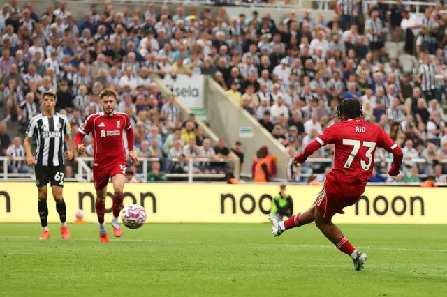 Rio Ngumoha of Liverpool scores his team's third goal during the Premier League match between Newcastle United and Liverpool at St James' Park on August 25, 2025 in Newcastle upon Tyne, England.