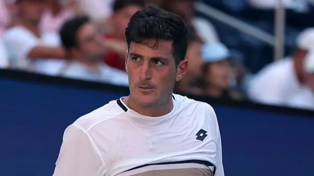 Federico Agustin Gomez looks on