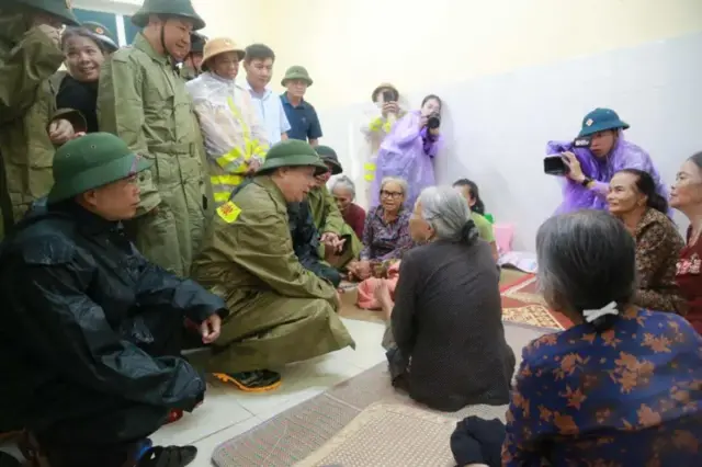 Vietnam's deputy prime minister pictured at an evacuation centre