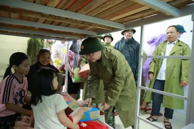 Vietnam's deputy prime minister pictured at an evacuation centre