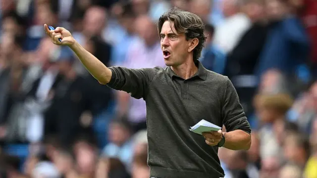 Thomas Frank managing Tottenham