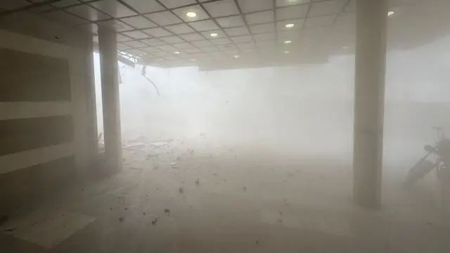 A view of dust following Israeli attacks on the Nasser Medical Complex in Khan Yunis,