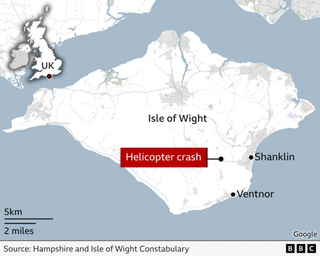 Map showing Isle of Wight, with towns of Shanklin and Ventnor marked on the south east of the island, a large red banner saying helicopter crash points to the site of the crash - to the west of Shanklin and north of Ventnor.
