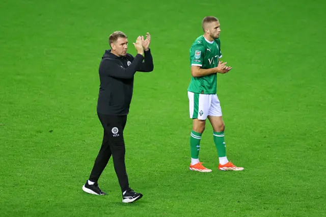 Dave Challinor, Manager of Stockport County, applauds the fans