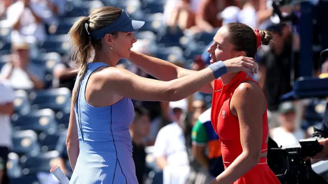 Marta Kostyuk hugs Katie Boulter