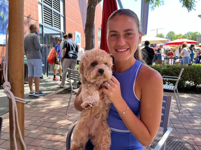 Marta Kostyuk and her dog