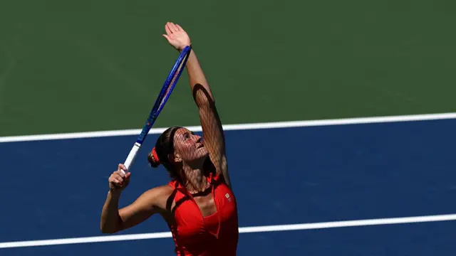 Marta Kostyuk of Ukraine serves