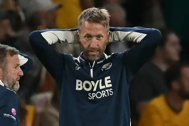 West Ham United's English head coach Graham Potter gestures