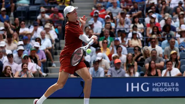 Jannik Sinner of Italy forehand returns against Vit Kopriva of Czechia