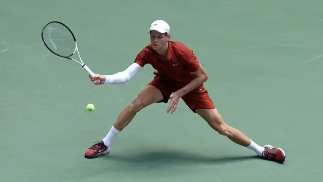Jannik Sinner of Italy returns against Vit Kopriva of Czechia