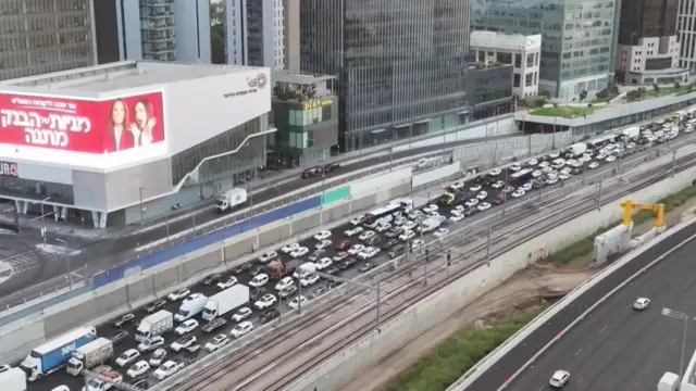 Cars are seen backed up on a major highway in Israel