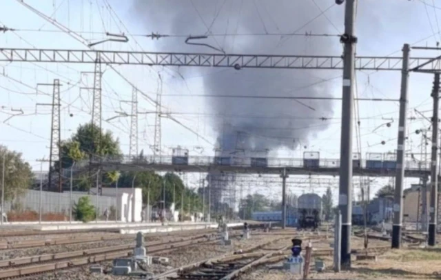 One of the images we verified shows a plume of smoke rising at the far end of a railway yard
