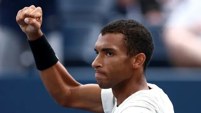 Felix Auger-Aliassime of Canada pumps his fist