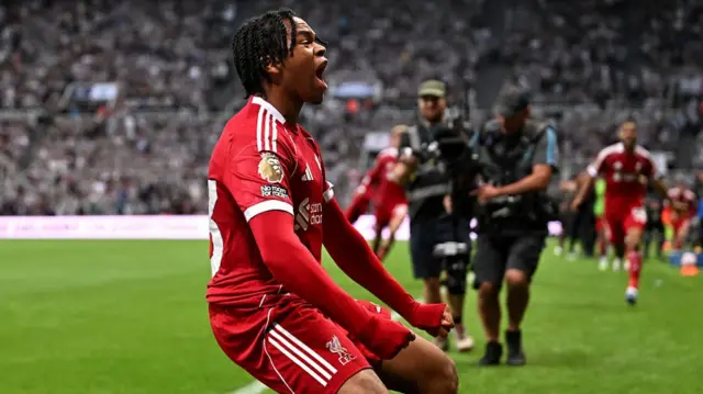 Rio Ngumoha celebrates after scoring for Liverpool