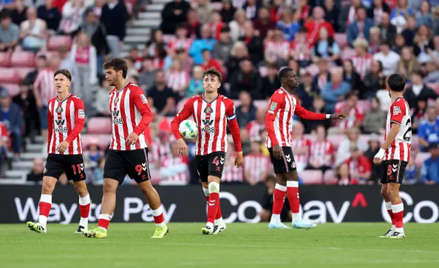 Dan Neil of Sunderland looks dejected after conceding their teams first goal
