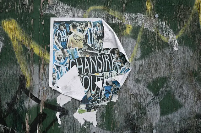 A poster against Sheffield Wednesday's Thai owner Dejphon Chansiri is seen outside