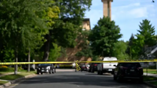 The Annunciation Catholic Church is seen behind police tape following a mass shooting on August 27, 2025 in Minneapolis