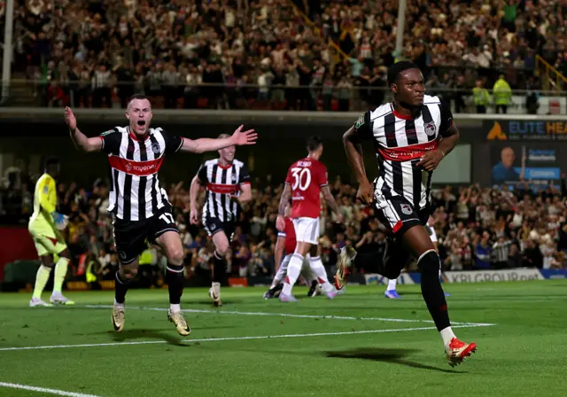 Tyrell Warren of Grimsby Town celebrates scoring his team's second goal during the Carabao Cup Second Round match between Grimsby Town and Manchester United at Blundell Park on August 27, 2025 in Grimsby, England.