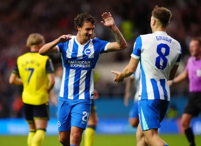 Brighton and Hove Albion's Olivier Boscagli celebrates