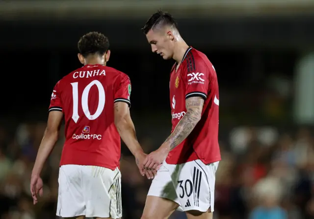 Manchester United's Matheus Cunha and Benjamin Sesko