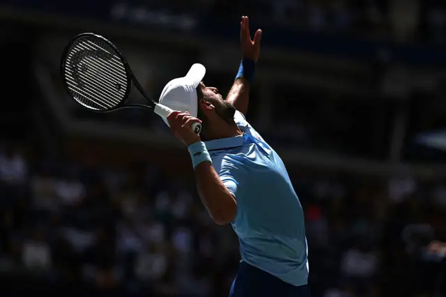 Novak Djokovic of Serbia serves