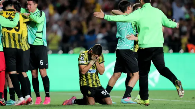 Valeri Gromyko celebrates after Kairat beat Celtic in a penalty shootout