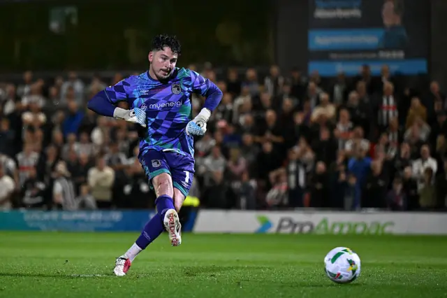 Christy Pym of Grimsby Town scores the team's eleventh penalty
