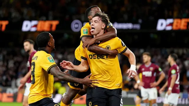 Jorgen Strand Larsen celebrates scoring Wolves' third goal during their Carabao Cup second round game with West Ham