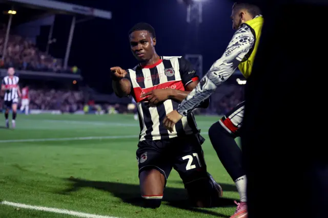 Grimsby Town’s Tyrell Warren celebrates scoring their side's second goal of the game