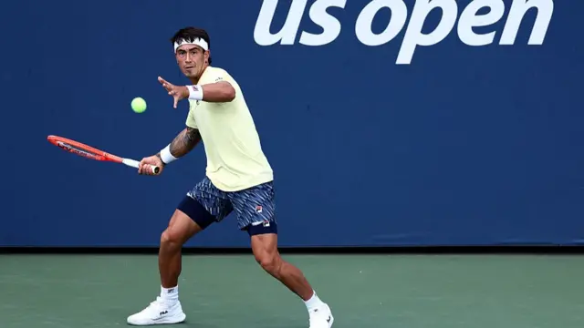 Francisco Comesana plays a forehand