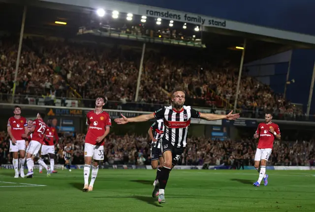 Grimsby Town celebrate.
