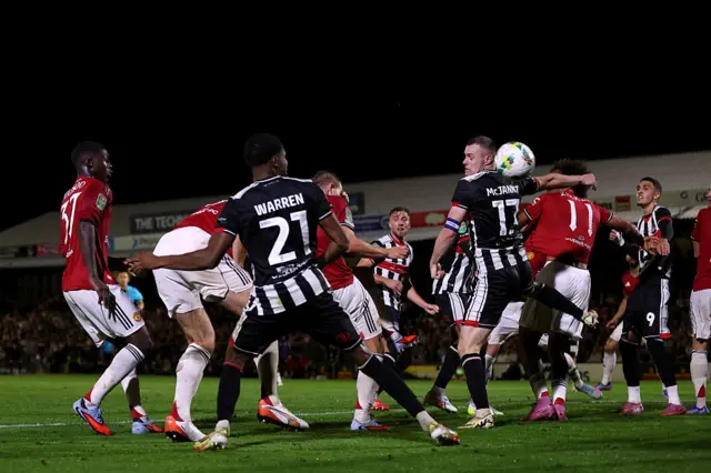 Harry Maguire of Manchester United (hidden) scores his team's second goal
