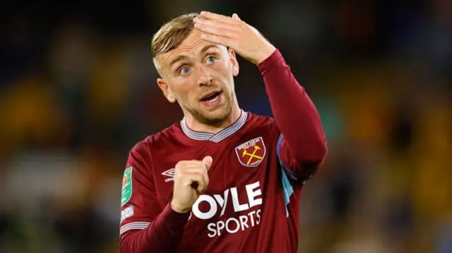 Jarrod Bowen beckons a West Ham fan following Wolves defeat