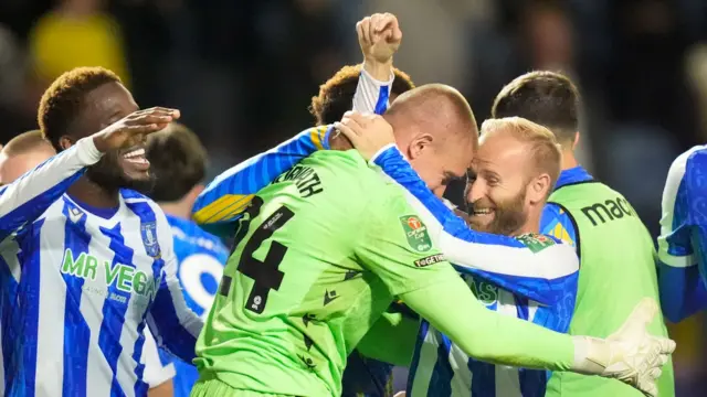 Barry Bannan and Ethan Horvath celebrate after Sheffield Wednesday beat Leeds in the EFL Cup