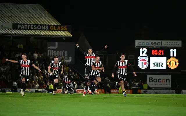 Grimsby Town celebrate.