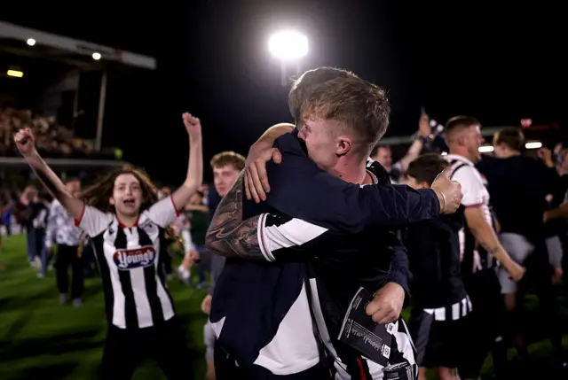 Grimsby Town fans celebrate.