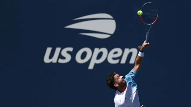 Cameron Norrie serves