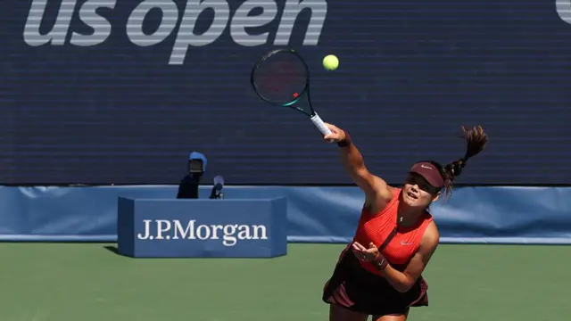 Britain's Emma Raducanu serves